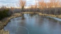 Slick Iced Vibrant Blue Pond in Rural wisconsin