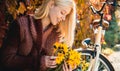 Autumn woman. Happy girl on autumn walk. Carefree young woman in trendy vintage pullover or sweater. Dreamy girl with Royalty Free Stock Photo