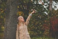 Autumn woman on leaves background