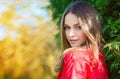 Autumn woman portrait smiling outdoors at the park. Royalty Free Stock Photo