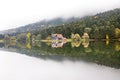 Autumn wooden Lake house inside forest in Bolu Golcuk National Park