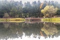 Autumn wooden Lake house inside forest in Bolu Golcuk National Park