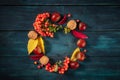 Autumn wreath with chestnuts and fall leaves, shot from above with a place for text Royalty Free Stock Photo