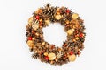 Autumn wreath of cones, nuts, and berries. Creative composition, the handmade