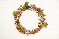 Autumn Wreath Flat Lay. Fall leaves in circle with berries,nuts, Royalty Free Stock Photo