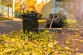 Autumn yellow leaves. Street area cleaning Royalty Free Stock Photo