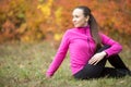 Autumn yoga: Ardha Matsyendrasana pose Royalty Free Stock Photo