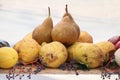 Autumnal concept with variety of pears in a basket Royalty Free Stock Photo