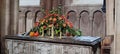 Autumnal Flower Display on Old Tomb, Norwich Cathedral, Norfolk, England, UK