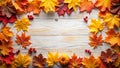 Autumnal framework featuring vibrant maple leaves and berries on wooden surface. Generative AI Royalty Free Stock Photo