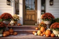 Autumnal front porch decor with pumpkins mums