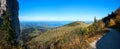 Autumnal hiking trail Kampenwand mountain with view to lake Chiemsee, upper bavaria Royalty Free Stock Photo