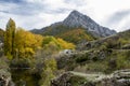 Autumnal landscape on the CurueÃÂ±o river. Cueto Ancino in the background, LeÃÂ³n, Spain