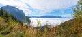 Autumnal landscape at Grunberg mountain, with view to foggy lake Traunsee and alps Salzkammergut, austria