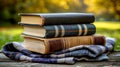 Autumnal Reading, Books on Wooden Bench with Cozy Tartan Scarf