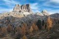Autumnal scenery in highlands. Alpine landscape  circled by colorful yellow and red fall trees in Dolomite mountains, Italy Royalty Free Stock Photo