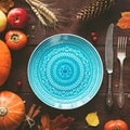 Autumnal table setting for Halloween or Thanksgiving day Royalty Free Stock Photo