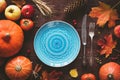 Autumnal table setting for Halloween or Thanksgiving day Royalty Free Stock Photo