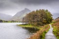 A view of Buttermere Lake with mount Fleetwith Pike in the background Royalty Free Stock Photo