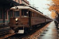 Autumnal vintage train station steam locomotive, nostalgic art, falling leaves serene ambiance Royalty Free Stock Photo