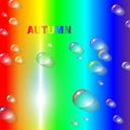 Autumns rainbow bright and motley abstract background with multicolored raindrops and rainbows color inscription-autumn. Joyful