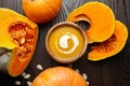 Autunm flat lay composition with pumpkin soup and fresh pumpkins Royalty Free Stock Photo