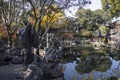 Autunm view over the rock and lake in the Lion Grove Garden in Suzhou, China Royalty Free Stock Photo