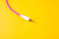 Aux wire on a yellow background Royalty Free Stock Photo