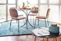 Auxiliary coffee table with decorative elements and in the background a dining table next to a gazebo