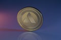 Avalanche AVAX Crypto Coin Placed on reflective surface and lit with orange and blue lights.