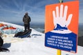 Avalanche danger sign with man horizontal