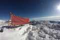 Avalanche danger sign in snow Royalty Free Stock Photo