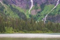 Avalanche Lake view of the center with three waterfalls