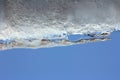 A avalanche slides down from a house roof