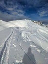 Avalanche snow cornice. Be careful of snow cornices on the mountain ridge. Avalanche went down. Girenspitz Schafberg Royalty Free Stock Photo