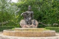 The Avalokitesvara Bodhisattva Buddha statue is in garden that is a graceful