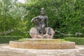 The Avalokitesvara Bodhisattva Buddha statue is in garden that is a graceful