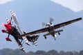 Melissa Andrzejewski flying an Edge 540 aerobatic aircraft with Skip Stewart flying in Pitts Special S-2 aircraft.