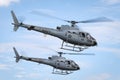 Royal Australian Navy Aerospatiale AS-350B Helicopters N22-001 & N22-016 from HMAS Albartoss flying in close formation