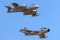 Gloster Meteor F.8 aircraft VH-MBX leading a CAC CA-27 Sabre North American F-86 in formation.