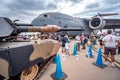 Avalon, Melbourne, Australia - Mar 3, 2019: Tank next to the military cargo plane