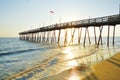 Avalon Pier and beach at the Outer Banks of North Carolina at sunrise Royalty Free Stock Photo