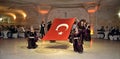 Avanos / Turkey - April 25, 2013: Traditional Turkish dancers dance for tourists in a local restaurant