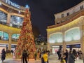 Aveiro, Portugal - December 10, 2023. Forum Aveiro Shopping mall illuminated with christmas lights in the city center at night.