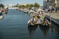 Traditional boats `gondolas` moliceiros on the Vouga River. Royalty Free Stock Photo