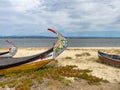 AVEIRO, PORTUGAL - JUL 5, 2023: Typical boats in the fishing that used to harvest algae on Aveiro lagoon once Village of Torreira