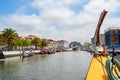 Aveiro, Portugal - July 17, 2019: First person view of sailing in Moliceiro, Traditional boat in Aveiro, sailing on the canal and Royalty Free Stock Photo