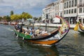 Canals with Moliceiros, traditional gondola boats on Ria de Aveiro Royalty Free Stock Photo