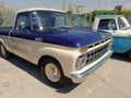 old white and blue utility pickup truck Ford 100 1960s. Expo Fierros 21 classic car show Royalty Free Stock Photo