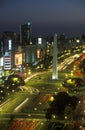 Avenida 9 de Julio, widest avenue in the world, and El Obelisco, The Obelisk at night, Buenos Aires, Argentina Royalty Free Stock Photo